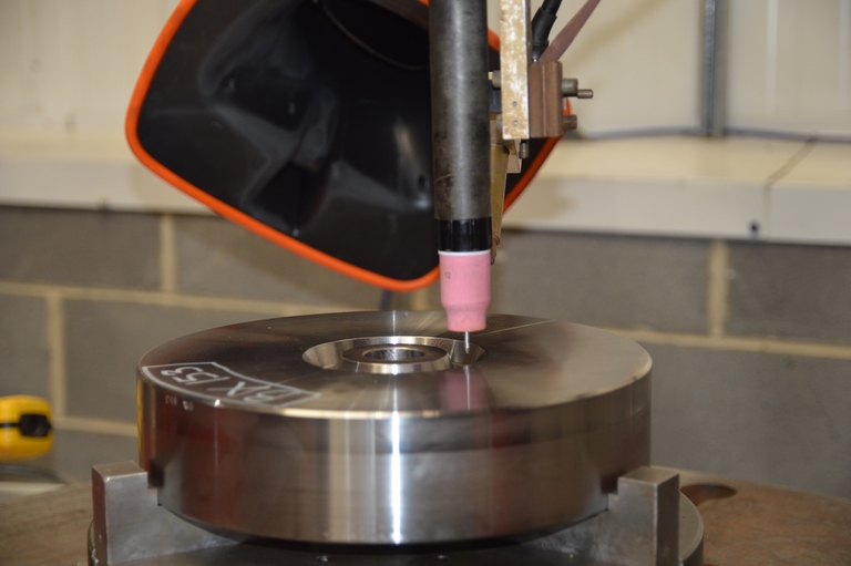 An arc welding machine makes contact with a Marcore API flange